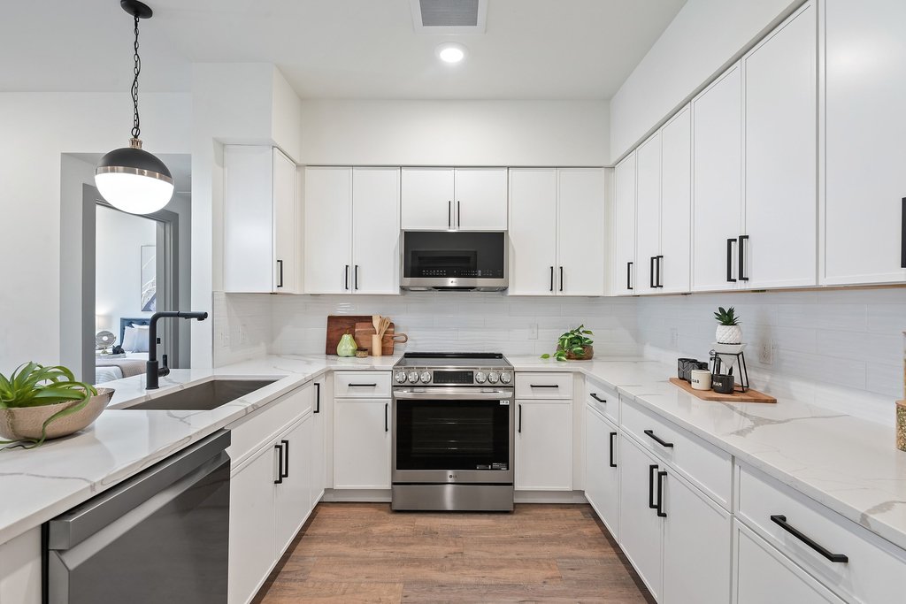Experienced property host inspecting furnished rental amenities before guest arrival